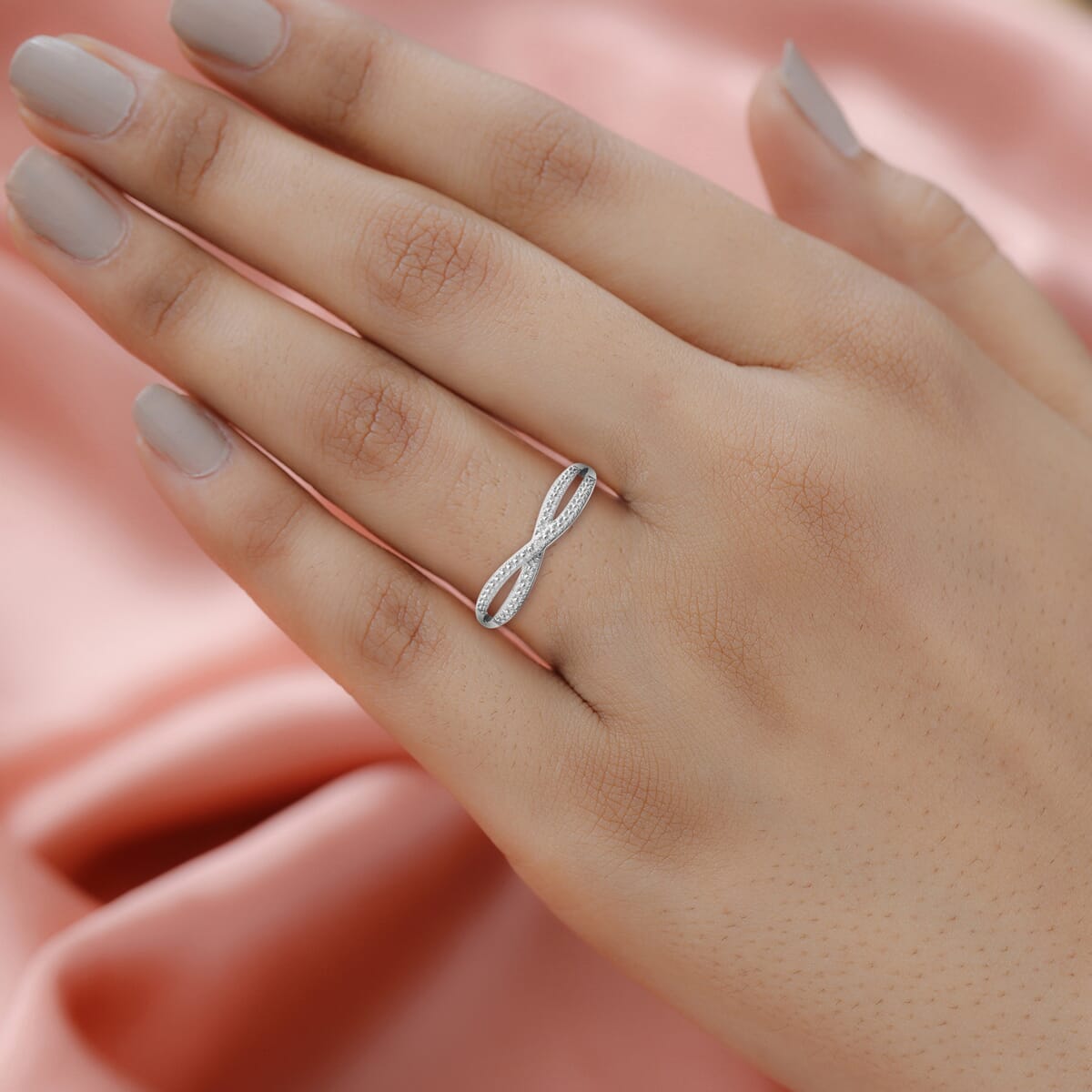 Diamond Accent Infinity Ring in Platinum Over Sterling Silver